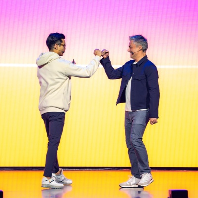 Gabe Monroy and Ryan Basilio high fiving at Workday DevCon