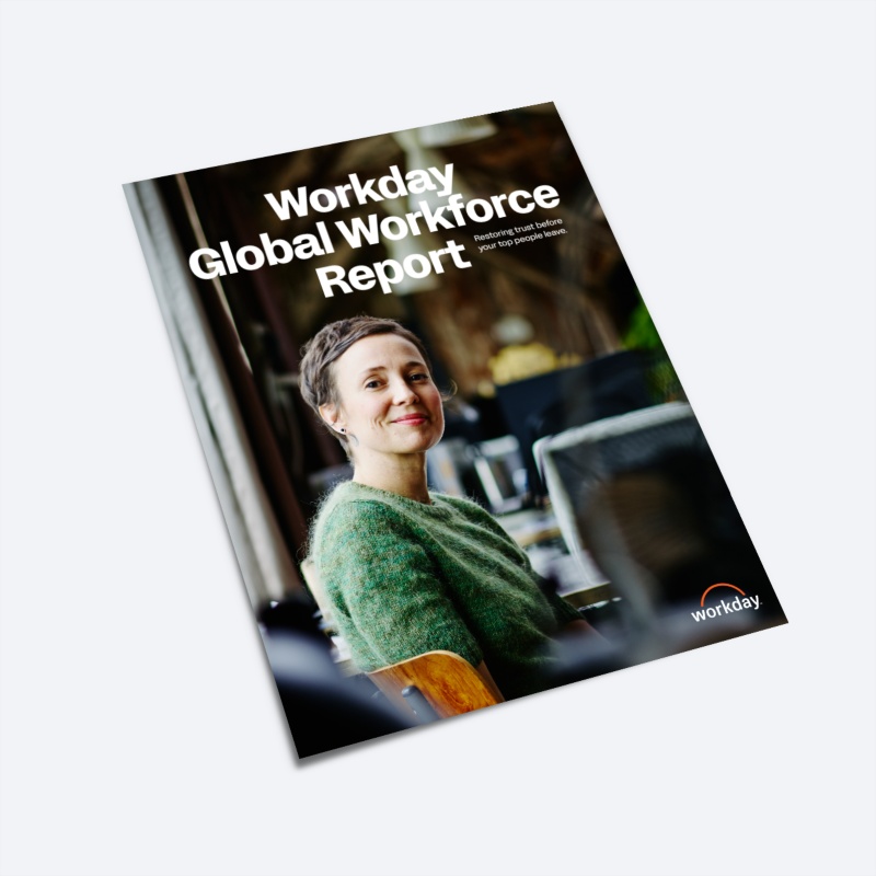 鶹ý "Global Workforce Report" cover, featuring a photo of a smiling person in a green sweater.