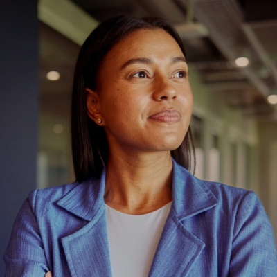 A photo of an Australian CFO looking out an office window.