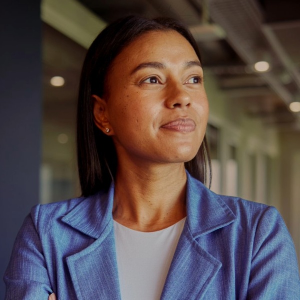 A photo of an Australian CFO looking out an office window.