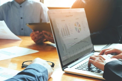 Laptop displaying financial results