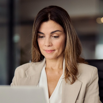 Business women on laptop in office