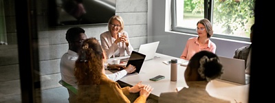 Colleagues sitting at a table
