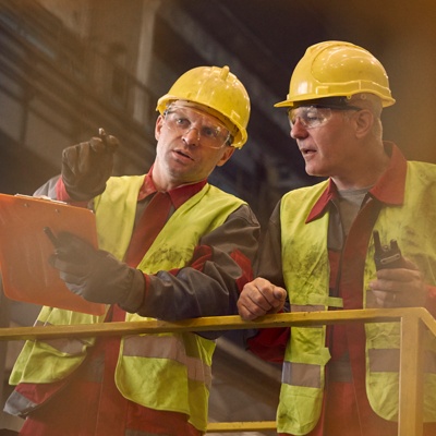 Construction workers collaborating onsite