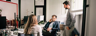 Coworkers talking in a group