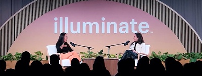 Danielle li and athena karp on stage with microphones illuminate tour