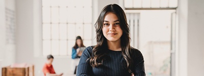 Woman looking into camera smiling