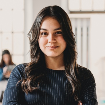 Woman looking into camera smiling