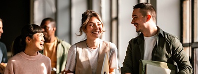 Group of coworkers smiling in office