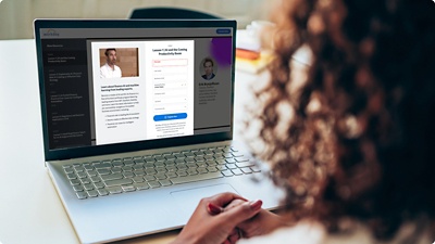 Laptop screen with training course enrollment page.