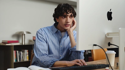 Image Man At Desk Using Desktop Computer 16x9