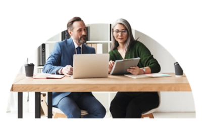 CFO and CIO reviewing work on a screen