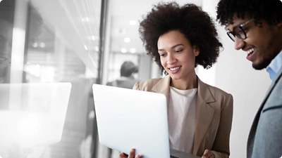 People looking at a tablet.