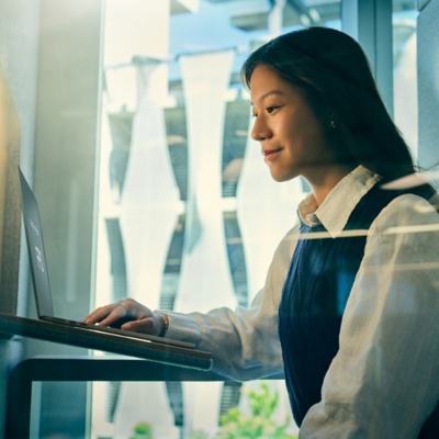 Payroll administrator reviewing AI-driven payroll automation insights.