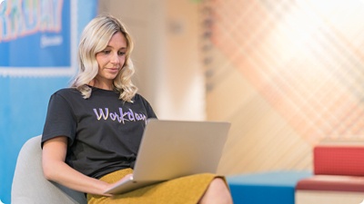 Woman working remotely on laptop.