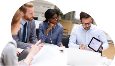 Group of investors checking out a chart on an iPad