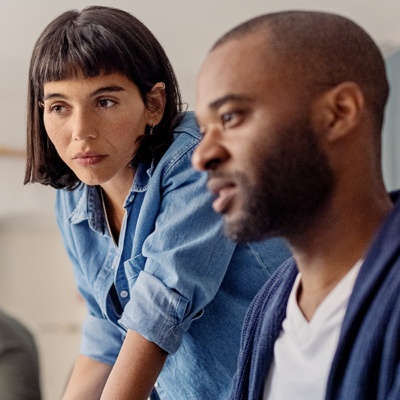 Man and woman looking at computer
