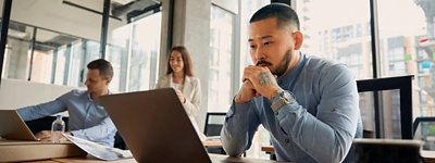 Man looking at a computer