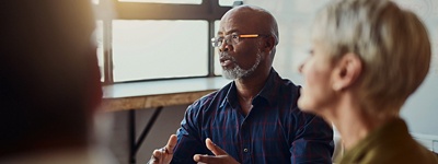 Man with glasses with serious expression