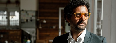 Man in orange glasses