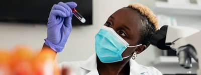 Medical professional testing blood sample