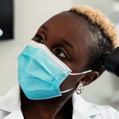Medical professional testing blood sample