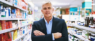 Business leader wearing a suit in a retail store