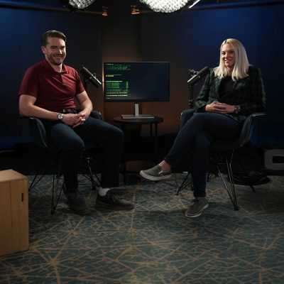 Image shows developers Angie Bonini, from The Groove, and Joe Anselmi, from Intecrowd, in conversation