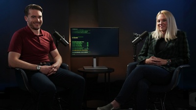 Image shows developers Angie Bonini, from The Groove, and Joe Anselmi, from Intecrowd, in conversation