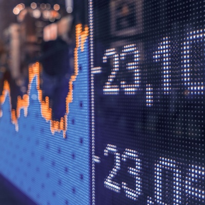 A digital screen showing FP&A data on a public sidewalk