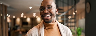 man smiling in office