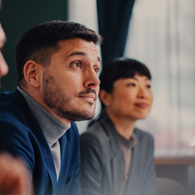 Three people looking into right