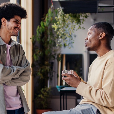 Two people in conversation at work