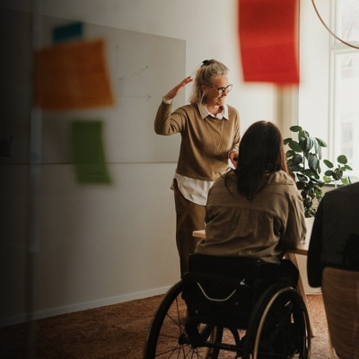 People having a meeting in an office discussing a plan or strategy