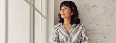 Woman slightly smiling looking to side