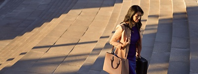 A woman giving a financial presentation in an office